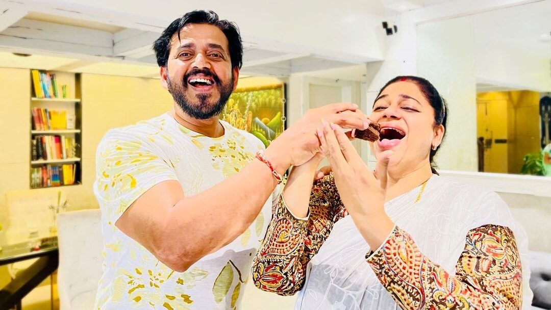 Ravi with his wife Preeti Kishan.